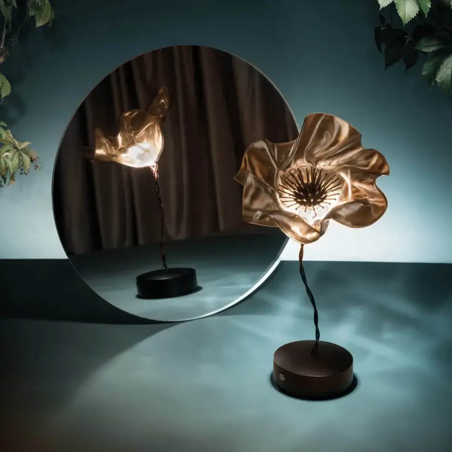 Superior Slamp LaFleur Battery lamp hand-molded in Lentiflex with a glossy gold finish and dark magnetic base