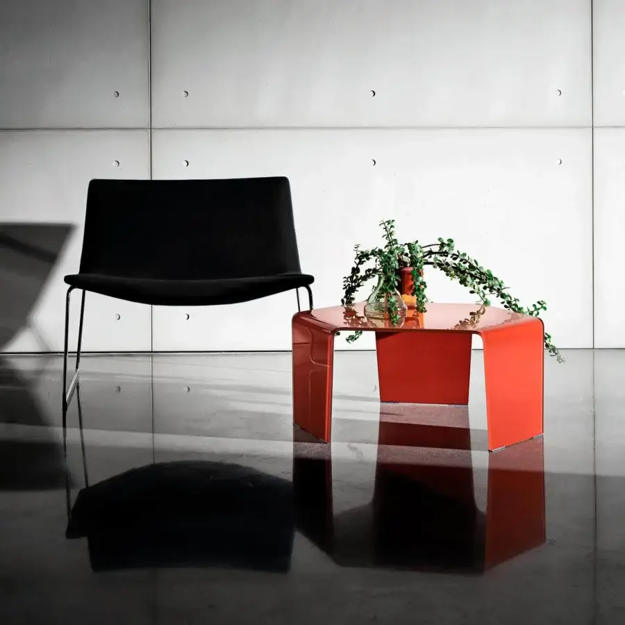 Exclusive Sovet Italia coffee table crafted in bent glass with a glossy vibrant red finish and hexagonal form