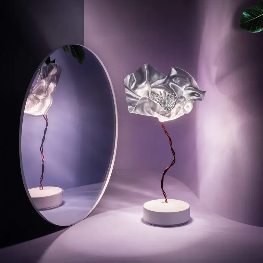 Exceptional Slamp LaFleur Battery lamp hand-molded in Lentiflex with a spiraled red copper wire and matte white base
