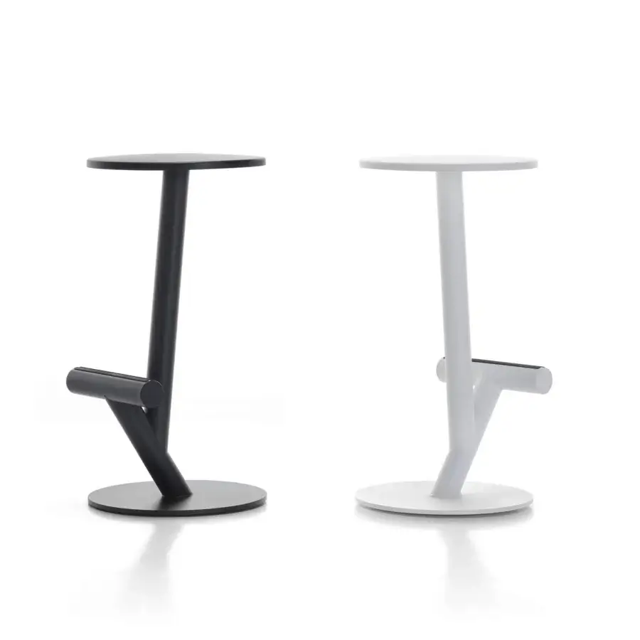 Distinguished MDF Italia Twig stool with black FreeForm integral polyurethane seat and micro-goffered steel structure built with a polypropylene footrest