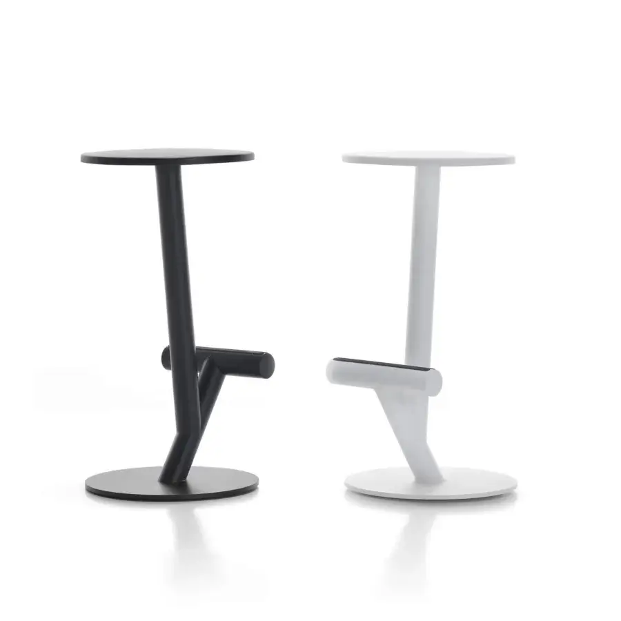 Distinguished MDF Italia Twig stool in black powder-coated steel with integral polyurethane seat and polypropylene footrest strips