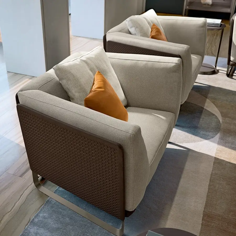Superior Turri Milano lounge chair with woven light beige leather and curved brushed nickel metal legs