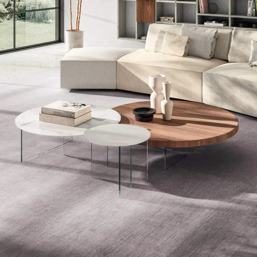Exceptional Lago Air Round coffee table with warm wood grain and transparent tempered glass legs