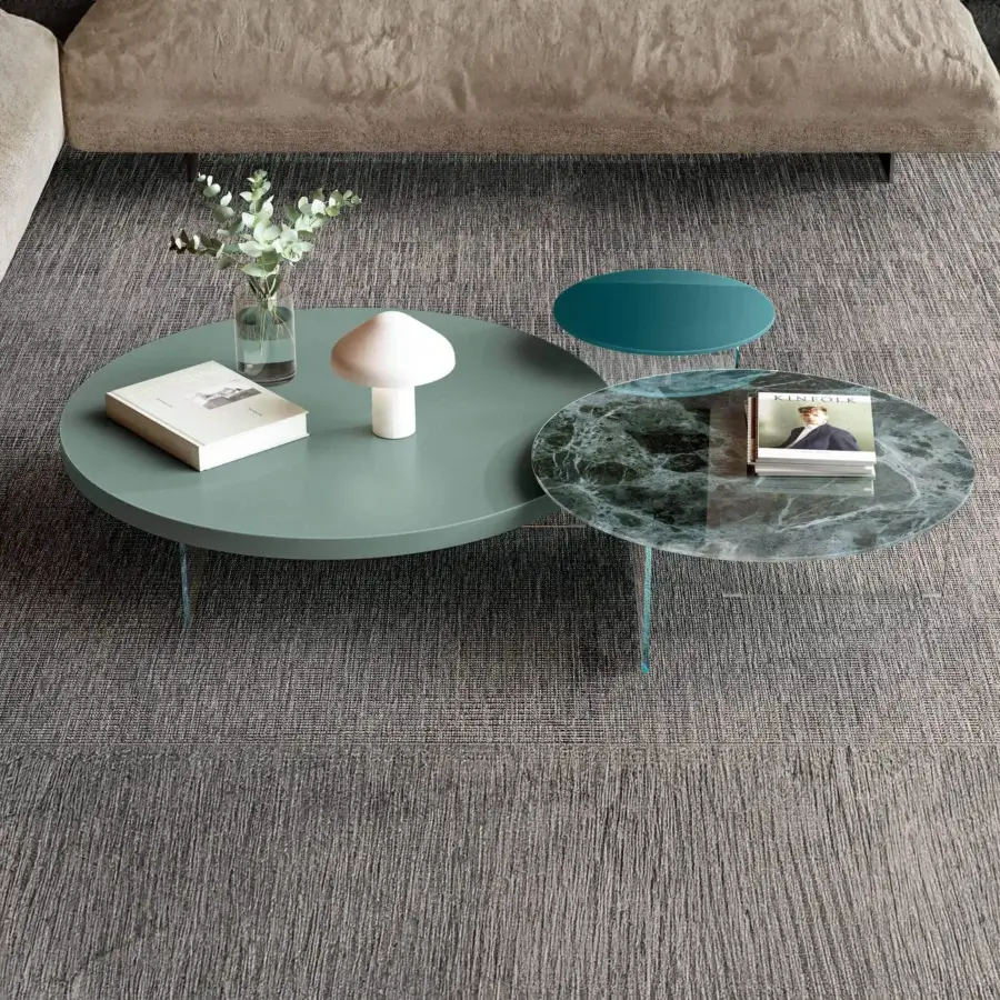 Distinguished Lago Air Round coffee table with lacquered teal finish and sturdy tempered glass legs