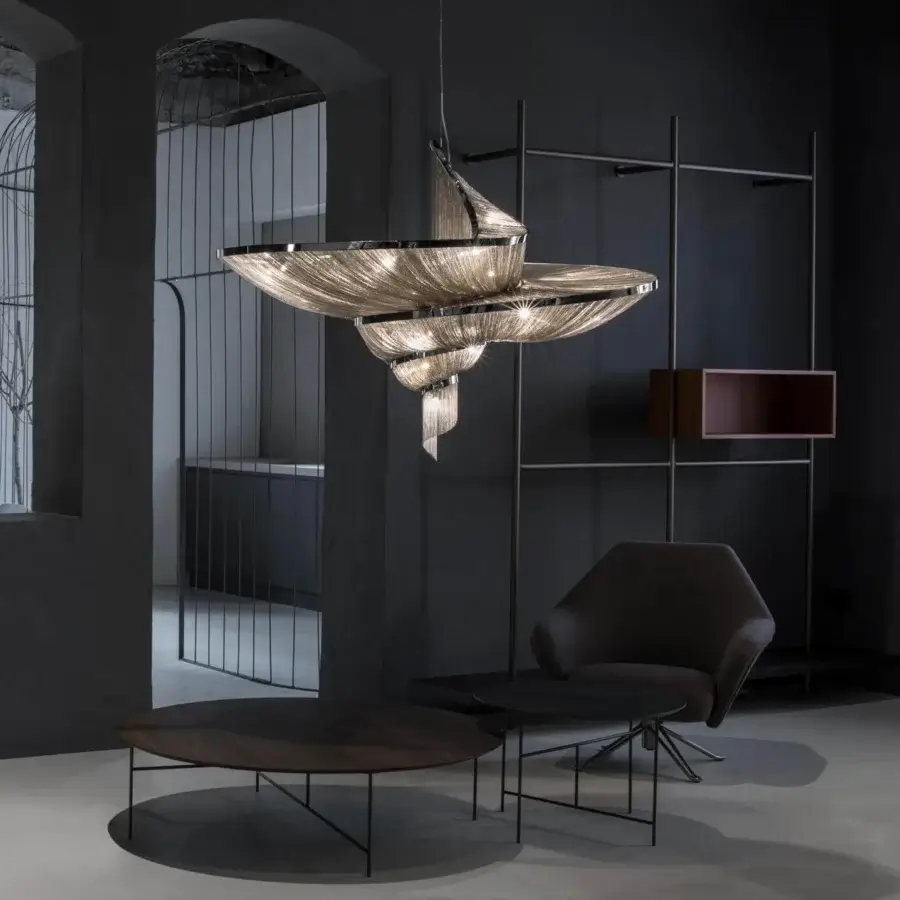 Exclusive Terzani Epoque suspension lamp crafted in curved silver metal with refined brass chains and nickel finish