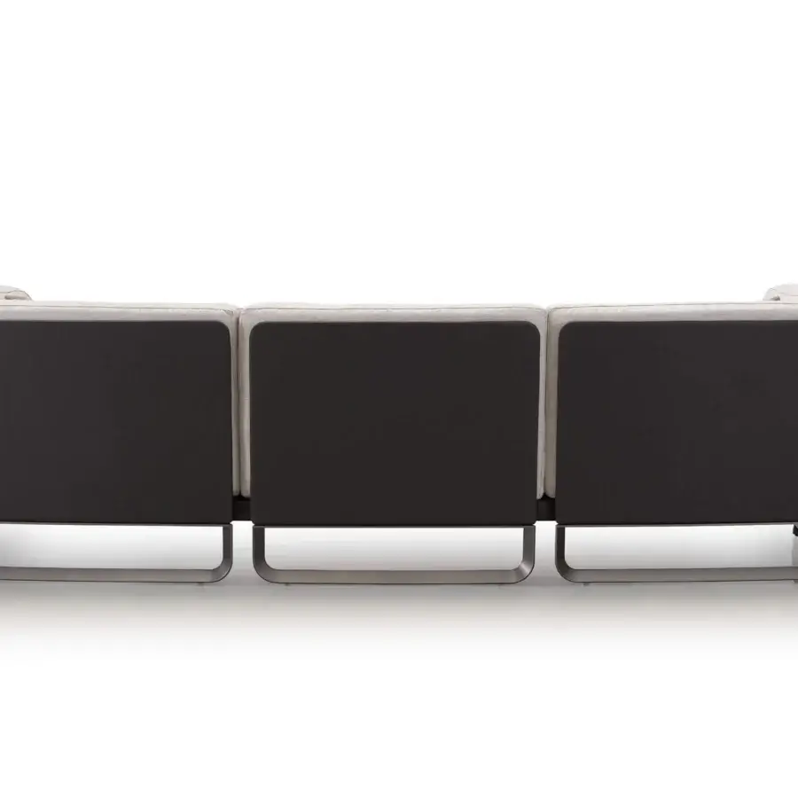 Exceptional Turri Milano sofa with woven leather enveloping the structure and neutral fabric, built with brushed nickel curved legs