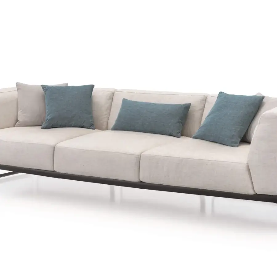 Lavish Turri Milano sofa with woven leather frame, curved brushed nickel legs and light beige textile upholstery complemented with blue-gray cushions