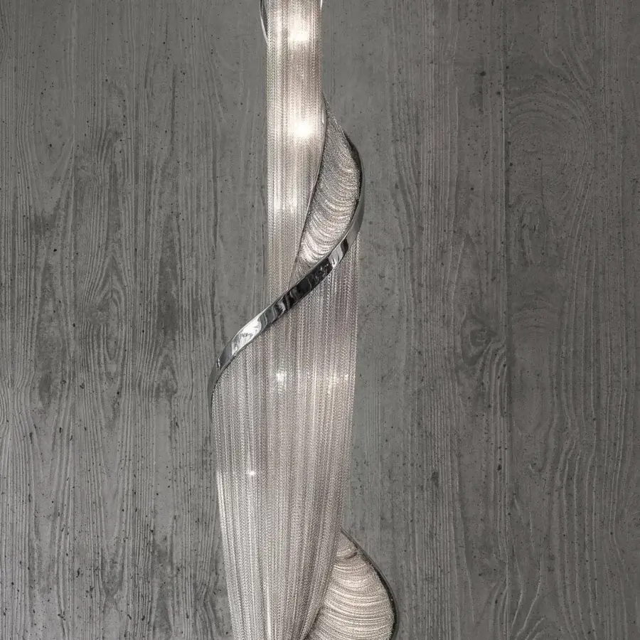 Exceptional Terzani Epoque suspension lamp with spiraling form built in nickel-finished brass chains for luminous effect