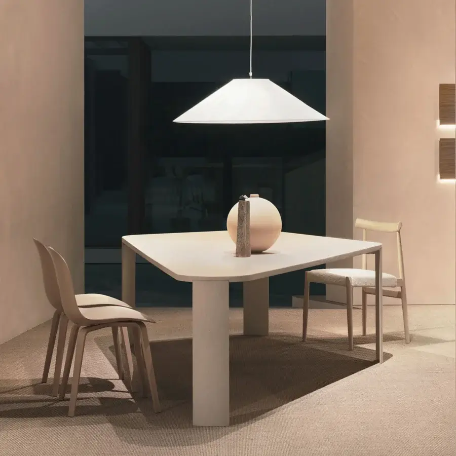 Superior MDF Italia Bonnet table with trapezoidal form, Coccioperla finish, and luminous mortar aggregate composition