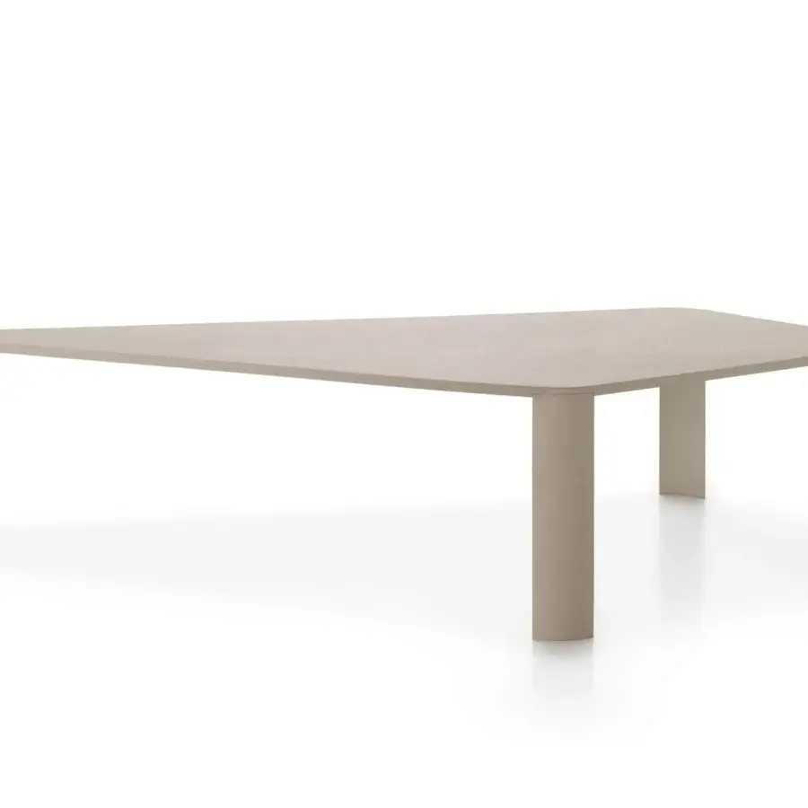 Distinguished MDF Italia Bonnet table with asymmetrical melamine top and Coccioperla metal frame exhibiting a unique tactile finish