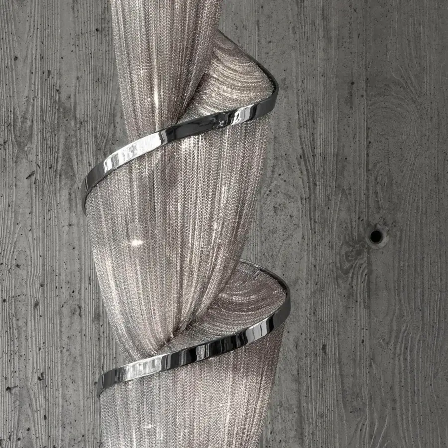 Exclusive Terzani Epoque suspension lamp with spiraling elongated form built in nickel-finished connected metal chains and polished rings