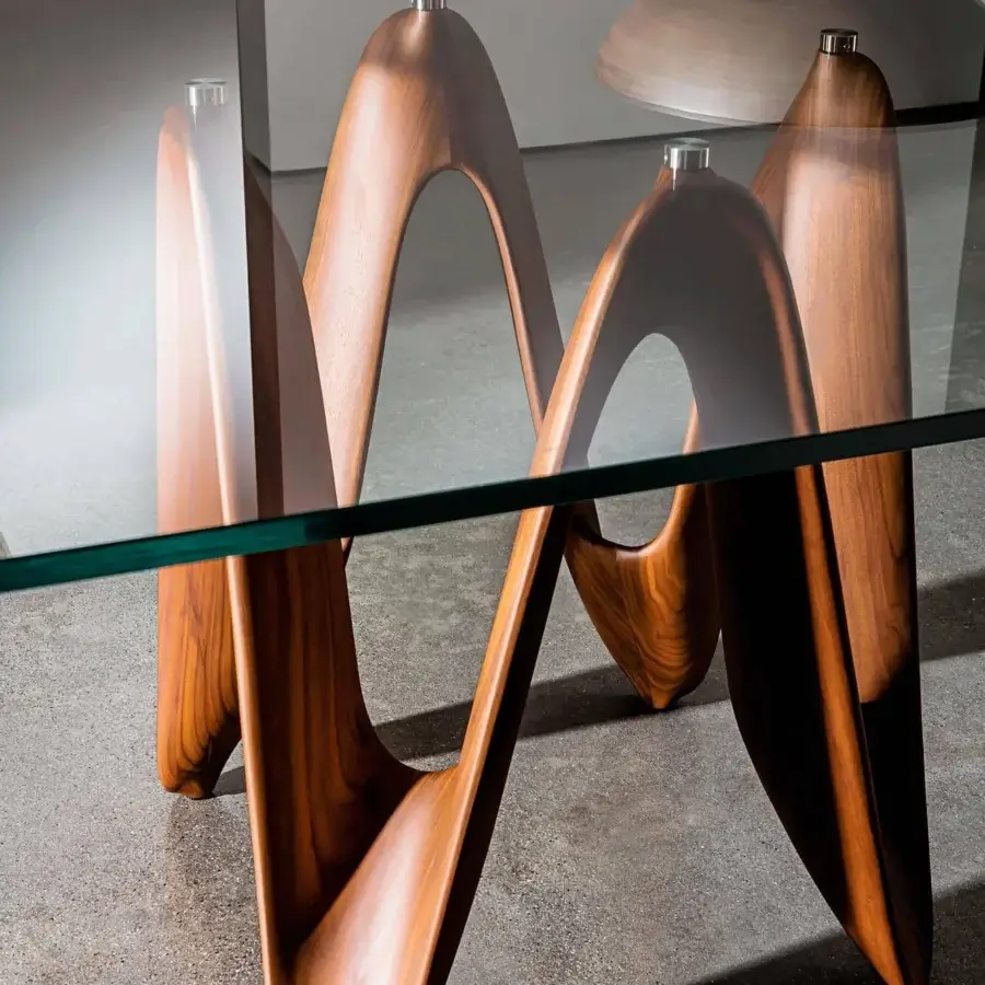 Distinguished Sovet Italia Lambda table with clear tempered glass and a smooth medium-brown Canaletto walnut wood base crafted in Italy