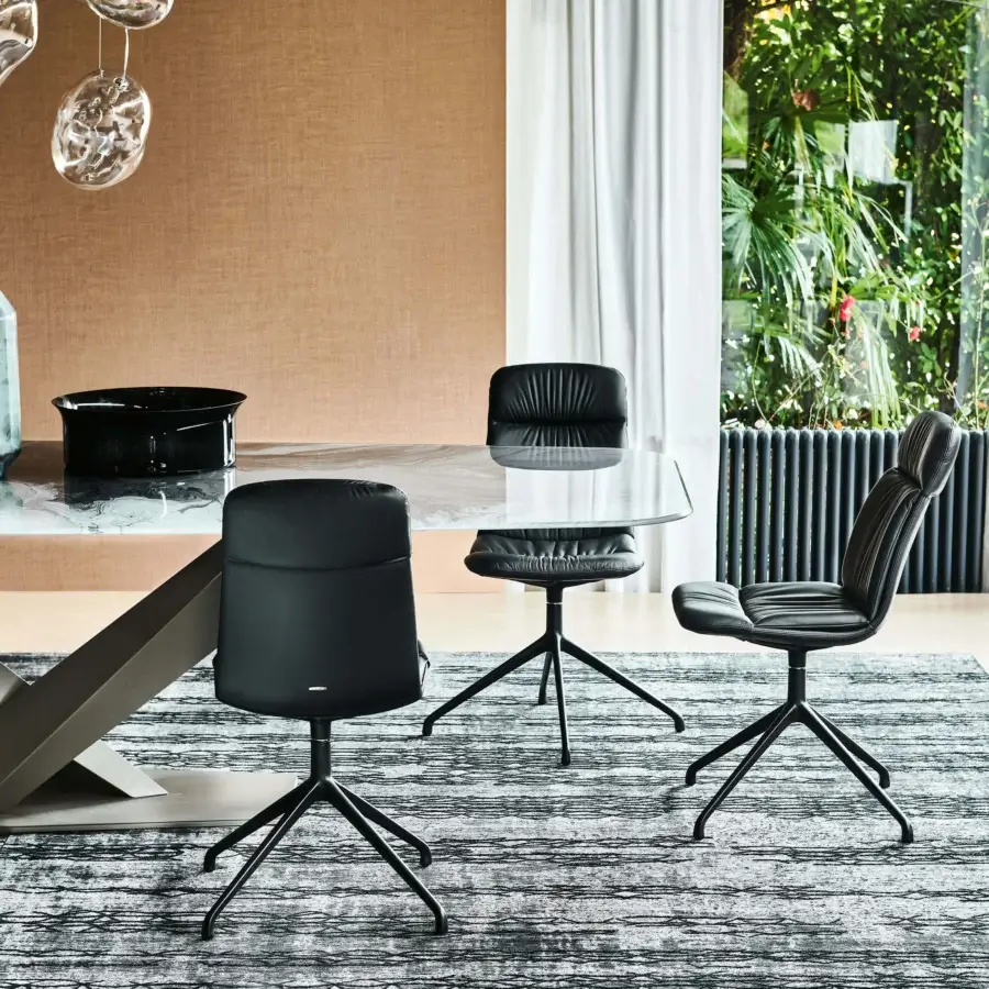 Sophisticated Cattelan Italia Kelly chair upholstered in sleek black leather with a matte finish and slender metal base