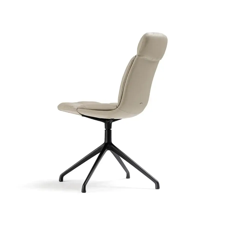 Lavish Cattelan Italia Kelly chair with voluminous folds, a taut shell and smooth light beige upholstery with dark metal base