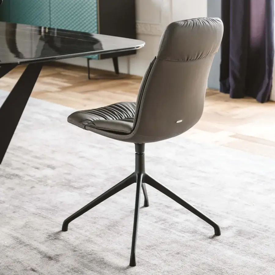 Distinguished Cattelan Italia Kelly chair with dark gray leather upholstery, a slender aluminum base and hand-sewn pleats