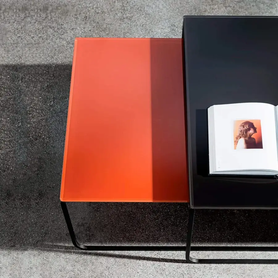 Captivating Sovet Italia Nido coffee table with layered black and orange lacquered glass plus matte black embossed metal frame