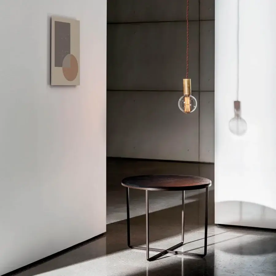 Elegant Sovet Italia Piktor side table with burnished metal frame and lacquered dark glass top