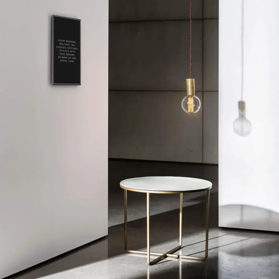 Captivating Sovet Italia Piktor side table with burnished metal frame and light-colored Materia glass top