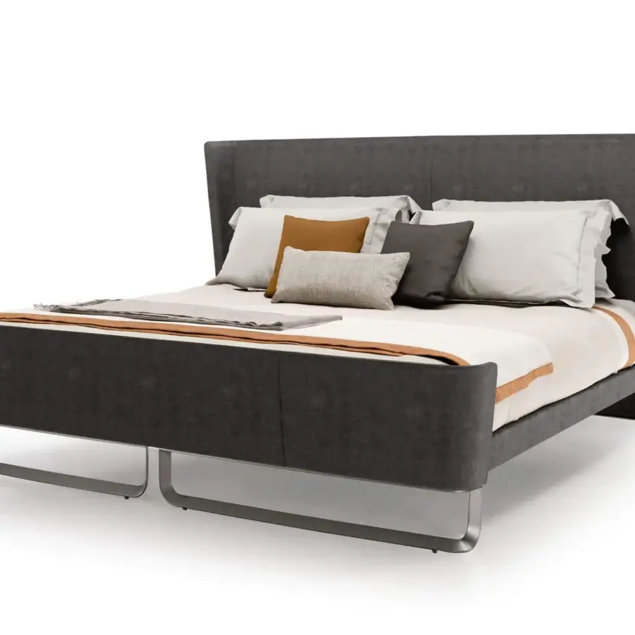 Exceptional Turri Milano bed with curved metal base and dark gray textured upholstery offering inviting comfort