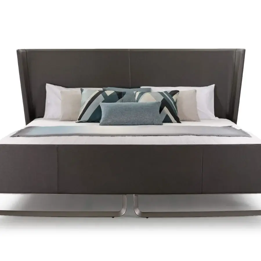 Superior Turri Milano bed with large headboard upholstered in dark gray textile and curved metal base crafted in Italy