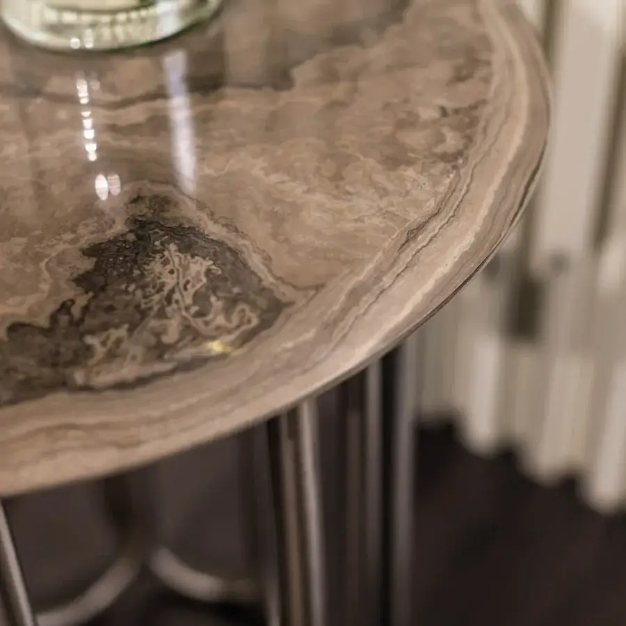 Exceptional Turri Audrey side table with swirling gray and cream marble-like tabletop and sleek cylindrical metal legs