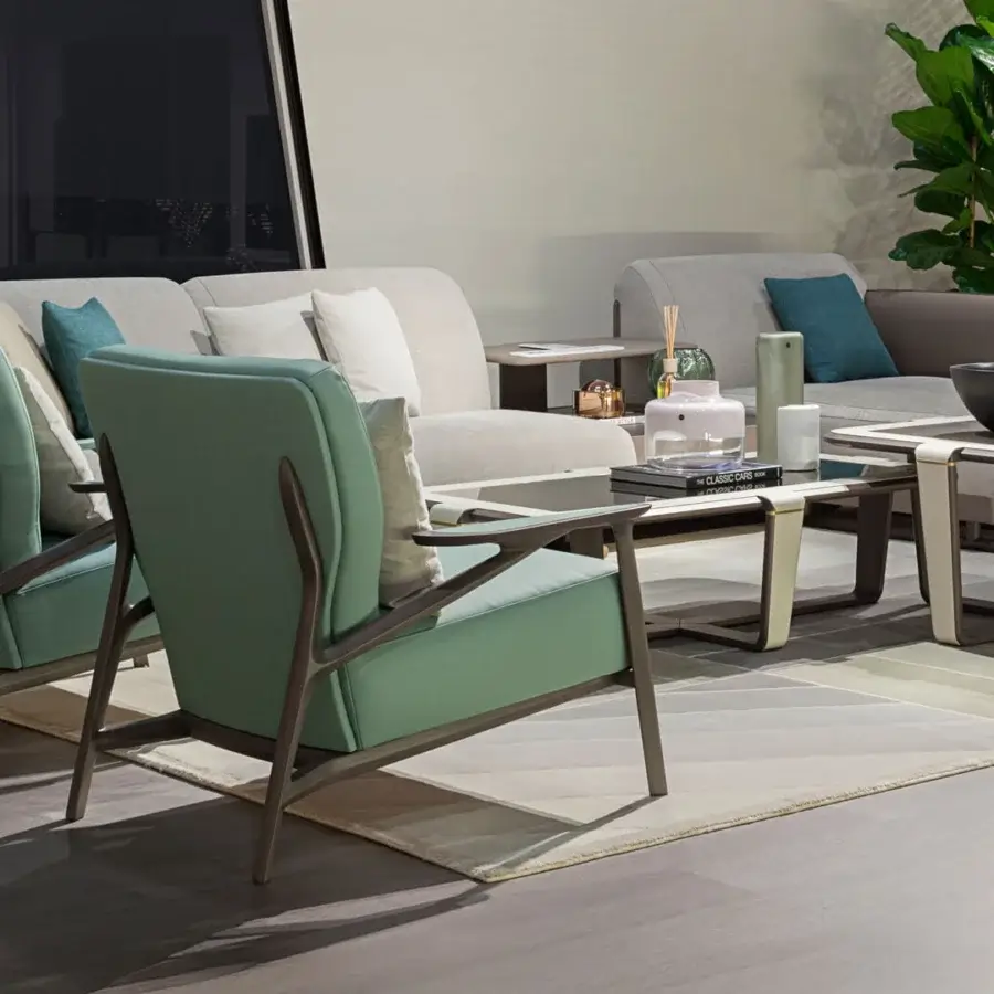 Exceptional Turri Vine lounge chair with dark-finished natural wood frame and smooth light green fabric upholstery