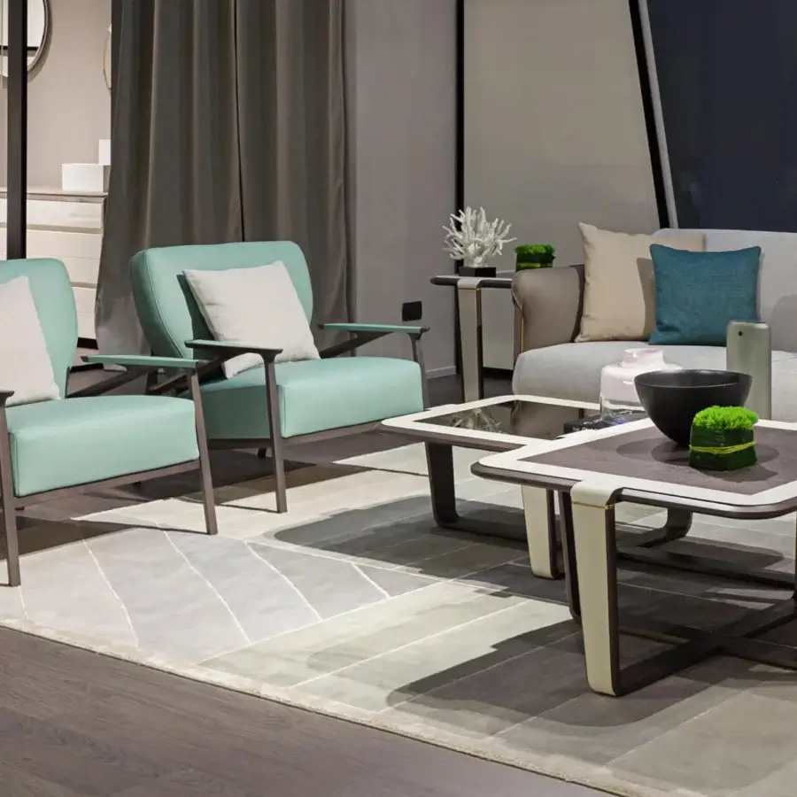 Stylish Turri Vine lounge chair with light green upholstery and branched natural wood structure built with a matte finish