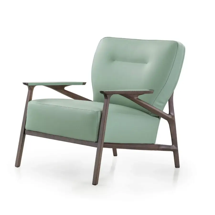 Elegant Turri Vine lounge chair with light green textile upholstery and dark-stained branched natural wood construction