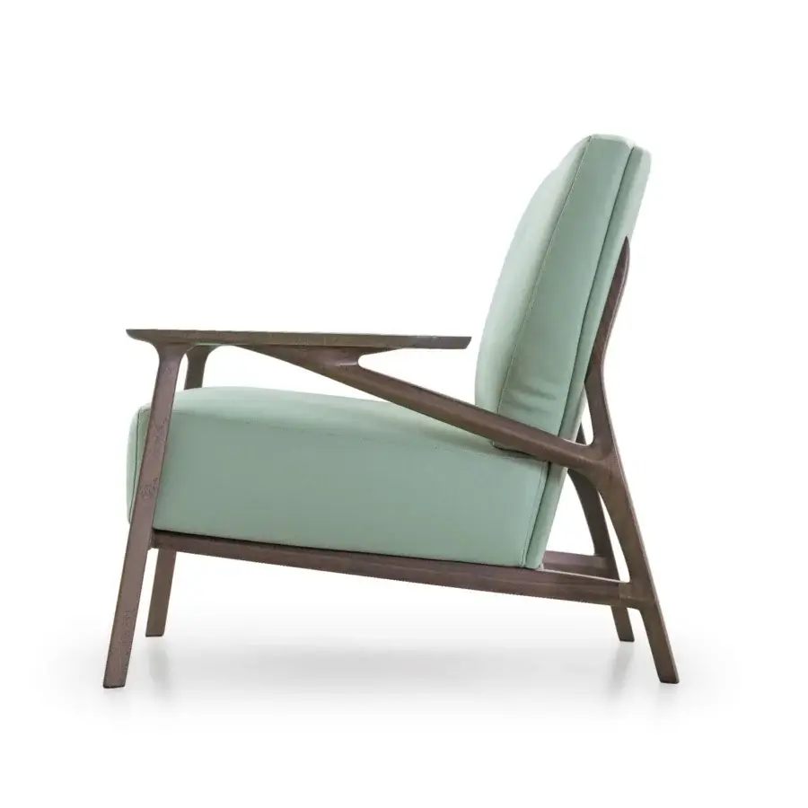 Superior Turri Vine lounge chair with angular elements, light green textile upholstery and matte-stained natural wood frame