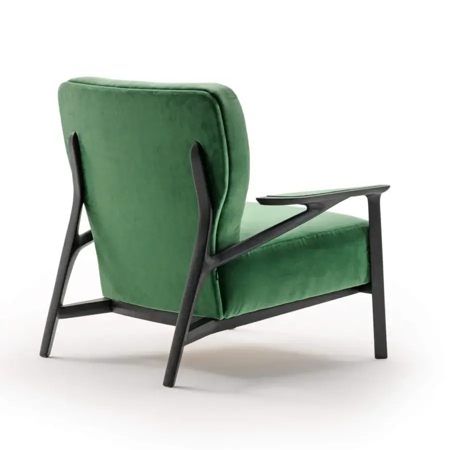 Distinctive Turri Vine lounge chair with branched natural wood and sumptuous green textile upholstery crafted with a matte finish