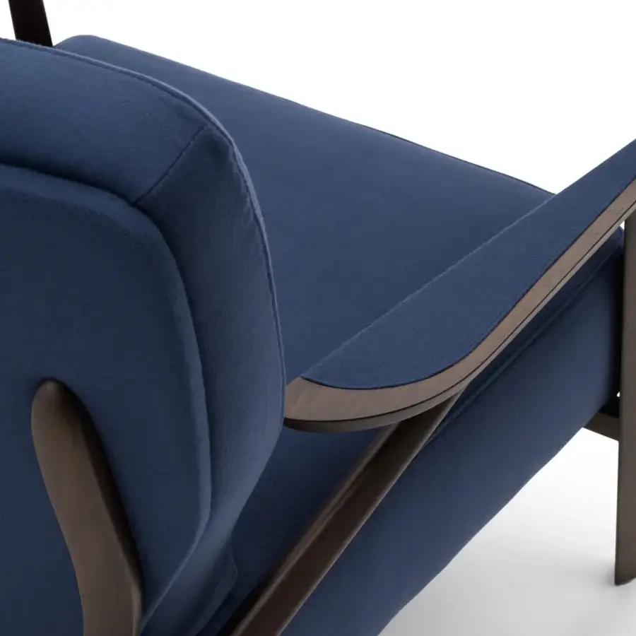 Distinguished Turri Vine lounge chair in deep blue fabric with dark brown natural wood and branched armrests