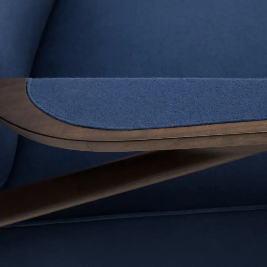 Exceptional Turri Vine lounge chair in uniform blue textile with branched natural wood and dark brown finish