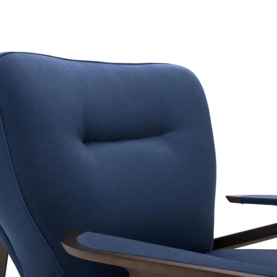 Sophisticated Turri Vine lounge chair crafted in deep blue textile with a branched natural wood frame and button detail