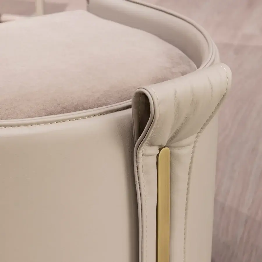 Distinguished Turri Vine ottoman showcasing light leather upholstery with a beige textile seat and brushed gold metal detail