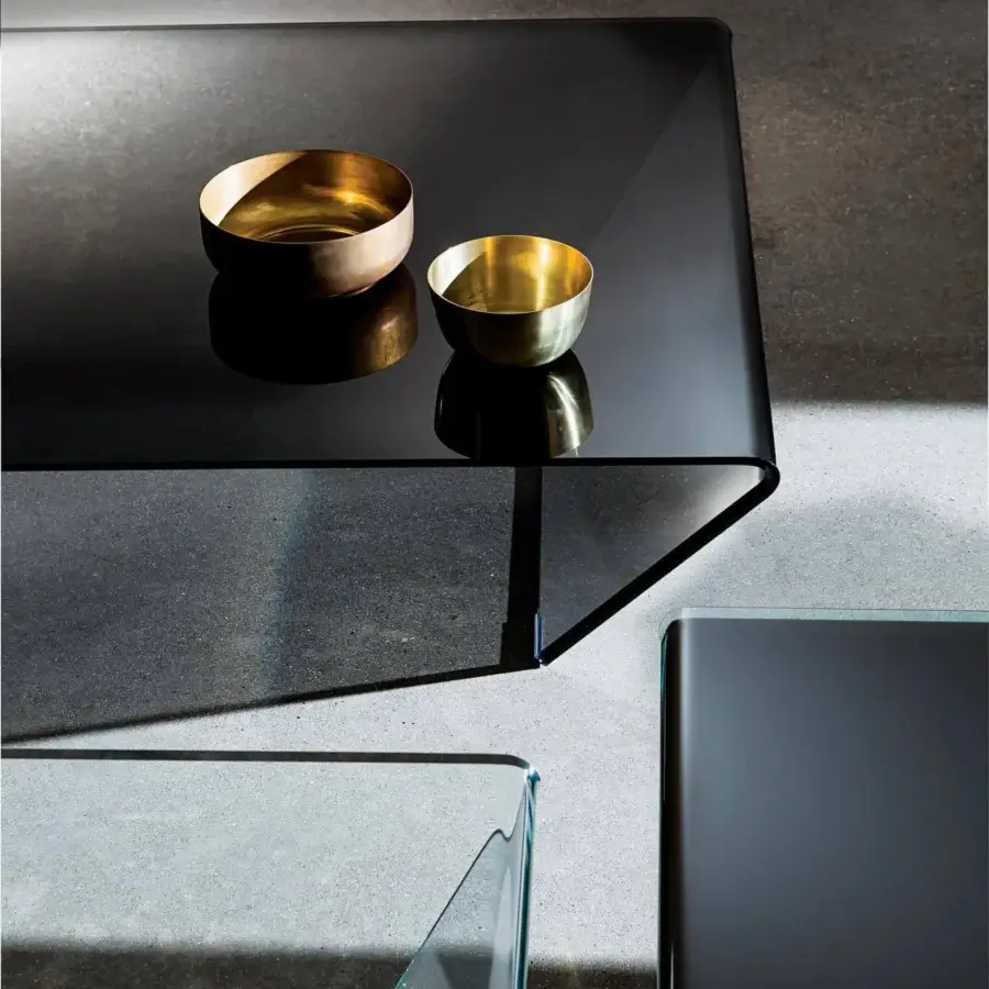 Distinguished Sovet Italia Rubino coffee table in bent smoked glass with a smooth reflective surface