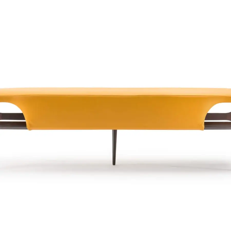 Distinguished Turri Vine bench with sinuous dark finished natural wood and bright yellow upholstery offering textural contrast