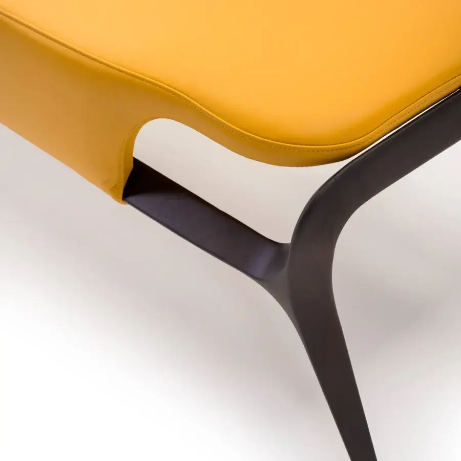 Exceptional Turri Vine bench with sinuous carved wood detailing and fully covered mustard yellow fabric seat
