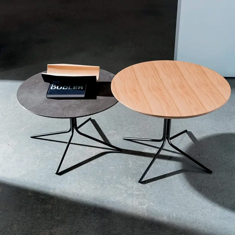 Distinguished Sovet Italia Genius coffee table with a sleek metal base and gray Materia round top in black lacquered finish