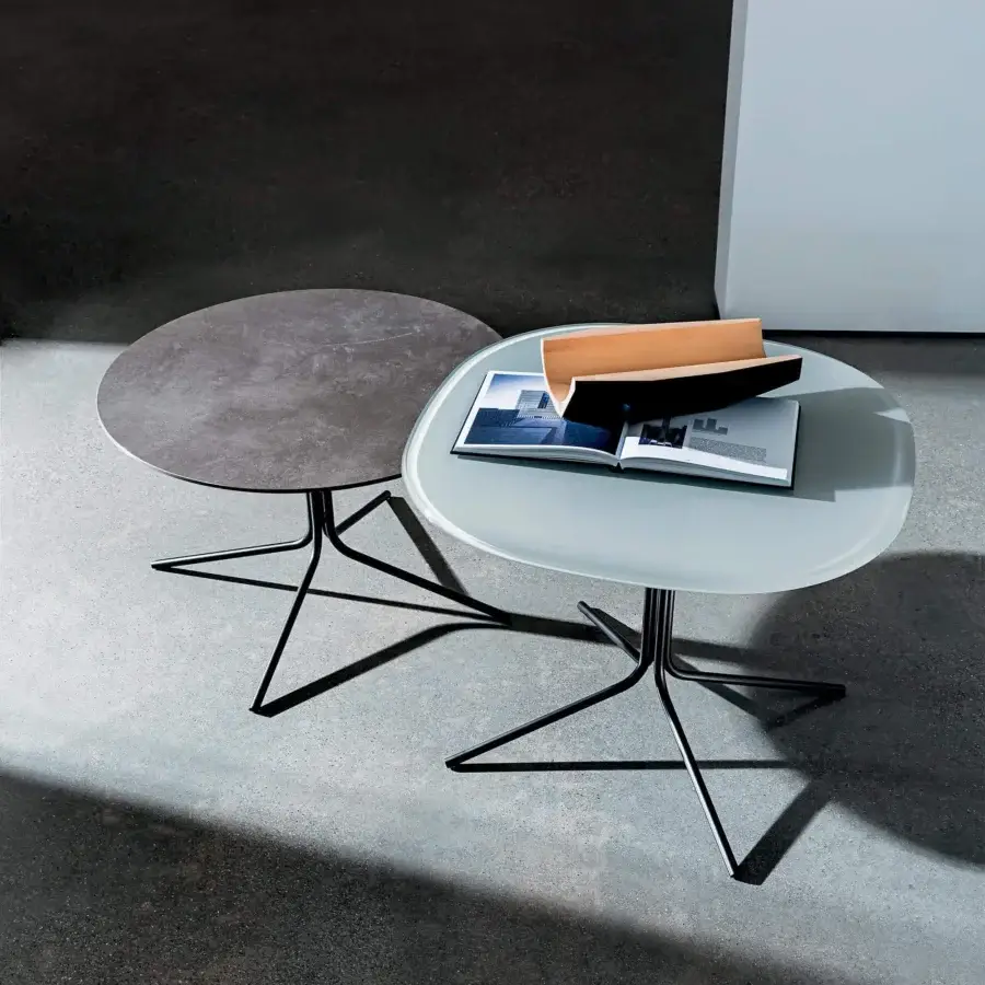 Elegant Sovet Italia Genius coffee table in pale blue glass and black lacquered metal with a matte finish