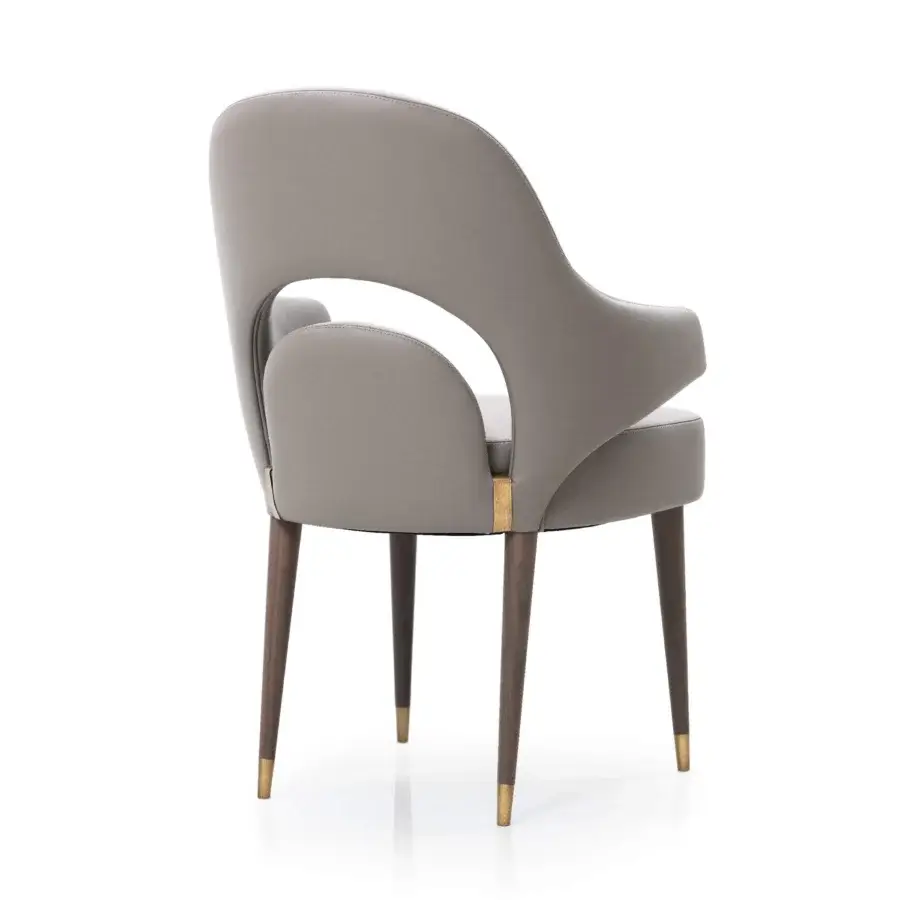 Superior Turri Vine armchair in gray textile upholstery with natural wood legs and brushed gold metal details