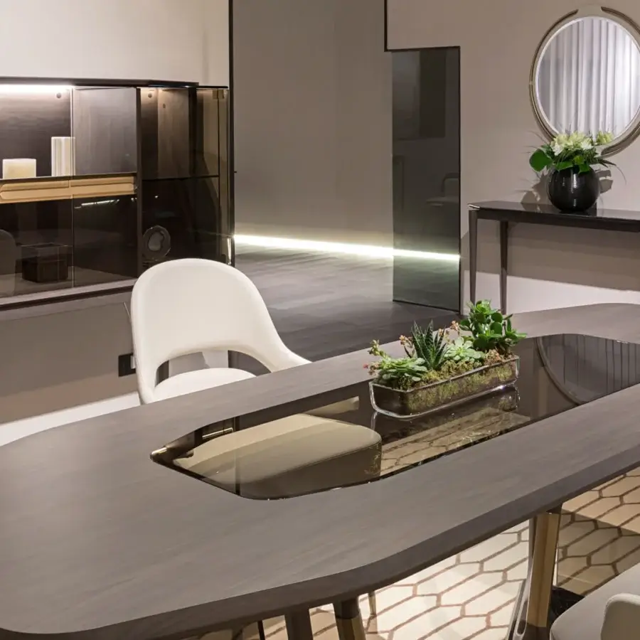 Superior Turri Vine table with a dark gray-brown wood structure, bronzed glass slabs and marble inserts in a matte finish
