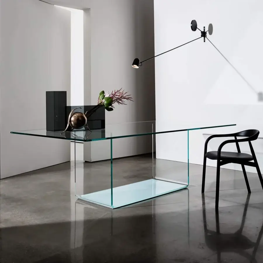 Exceptional Sovet Italia Valencia table with extra-light bent glass base and transparent glass tabletop with lacquered finish