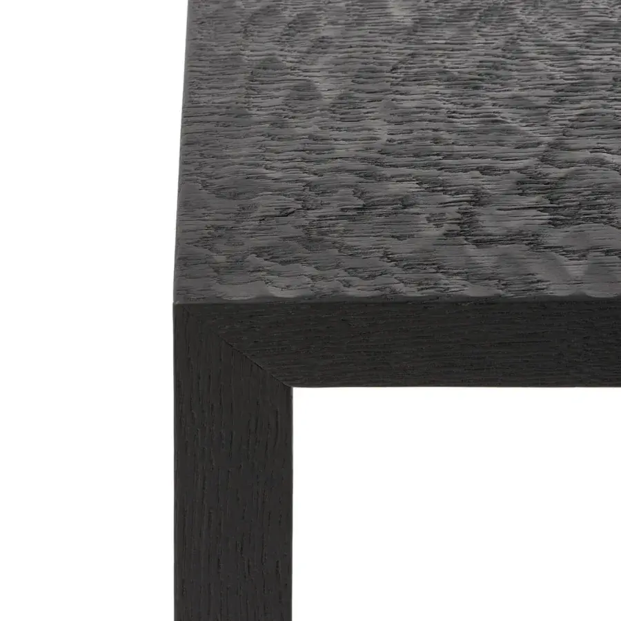 Exceptional MDF Italia Tense Material Heritage table crafted in black-stained oak with a meticulously textured, wavy surface and matte finish