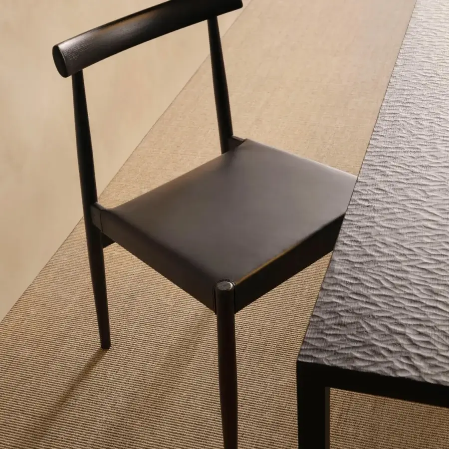 Distinguished MDF Italia Tense Material Heritage table crafted in black-stained oak with a meticulous wood hand carving finish