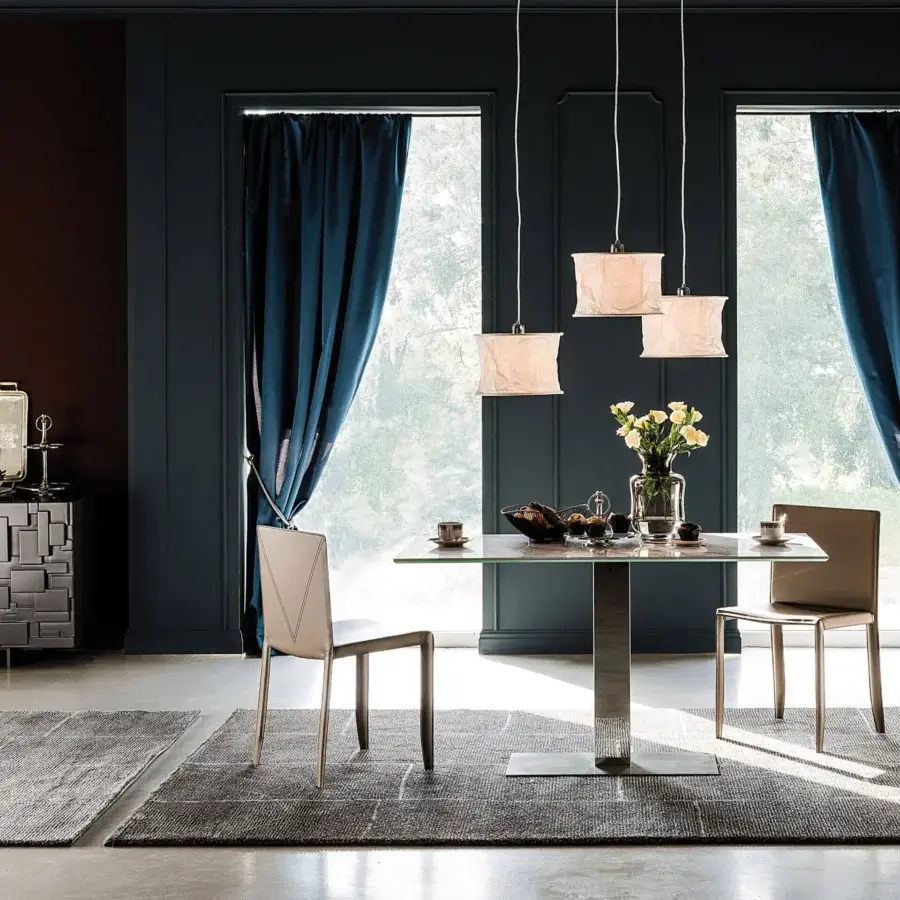 Elegant Cattelan Italia Elvis Keramik table with transparent glass top and dark-toned metallic pedestal base crafted in Italy