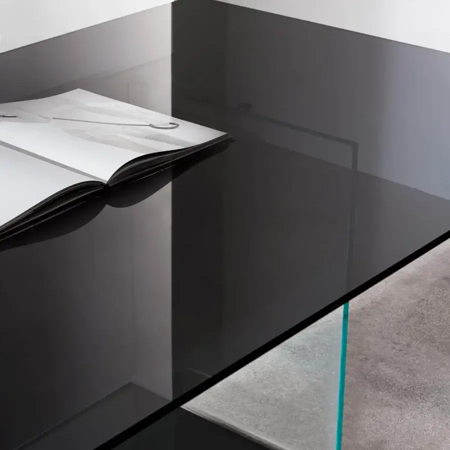 Distinguished Sovet Italia Valencia table with extra-light bent glass base and dark smoky finish