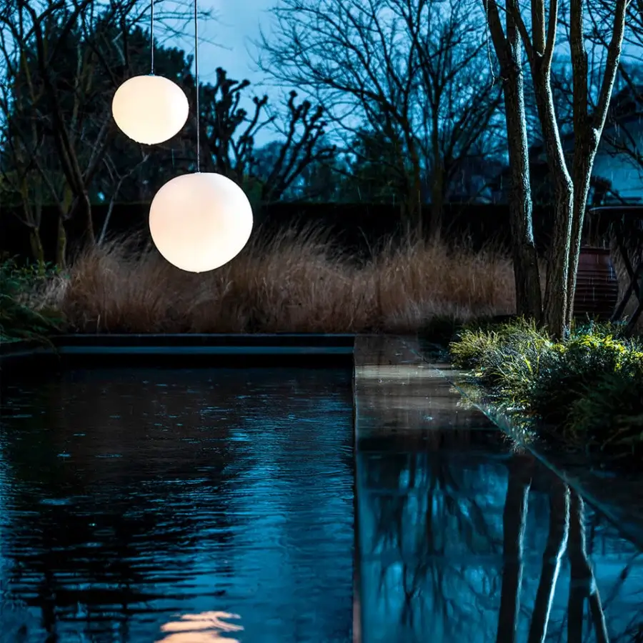 Elegant Foscarini Gregg Outdoor suspension lamp with a spherical diffuser crafted from rotational molded polyethylene and black neoprene cable