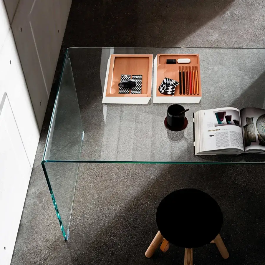 Elegant Sovet Italia Bridge Order Desk with transparent extra-light bent glass surface and seamlessly connected clear glass legs