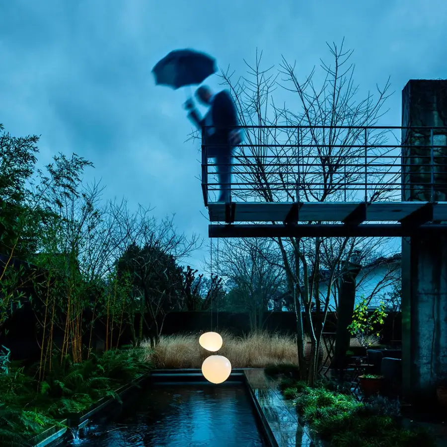 Distinguished Foscarini Gregg Outdoor suspension lamp with a globular shade crafted from rotational molded polyethylene and warm light