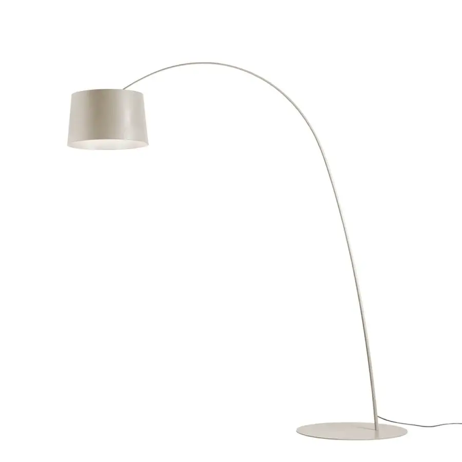 Distinguished Foscarini Twiggy floor lamp with a curved fiberglass composite structure and epoxy powder coated metal base